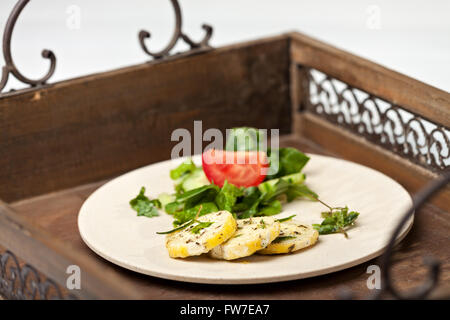 Primo piano della marinata di formaggio di capra Foto Stock