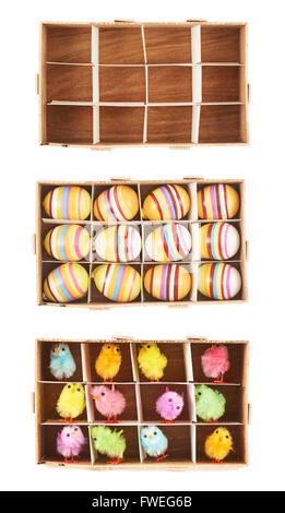 Uova, polli e scatole di legno Foto Stock