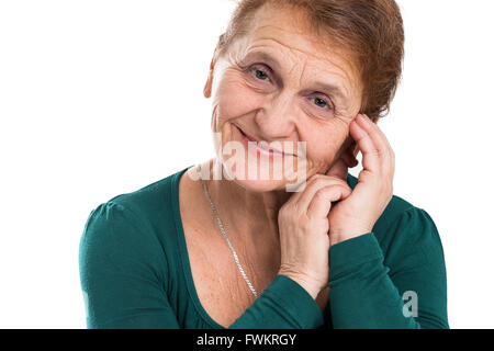 Ritratto di un felice vecchia donna su sfondo bianco Foto Stock