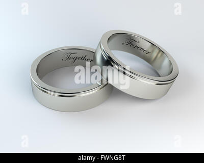 Gli anelli di nozze con incisione Foto Stock