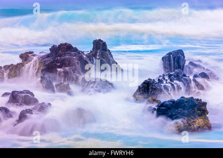 Onde sulla spiaggia a Maui Foto Stock