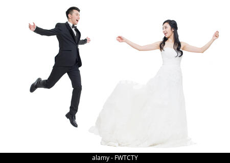 Felice sposa e lo sposo battenti Foto Stock