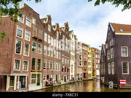 Case in Damrak quartiere di Amsterdam Foto Stock