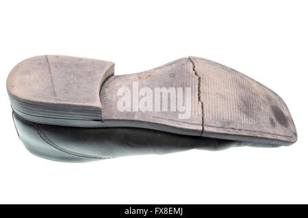 Danneggiato suola di una calzatura nero isolato Foto Stock