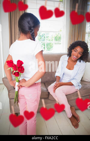 Immagine composita della figlia dando le rose a sua madre Foto Stock