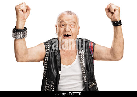 Studio shot di una felice coppia punk rocker gesticolando felicità con le sue mani isolati su sfondo bianco Foto Stock