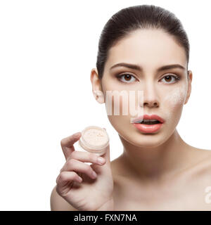 Bellissima ragazza con vaso con polvere allentata Foto Stock