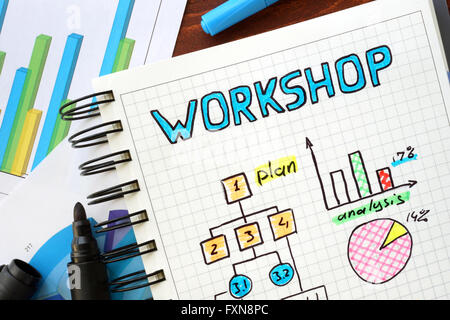 Workshop scritto in un notebook. Il concetto di business. Foto Stock