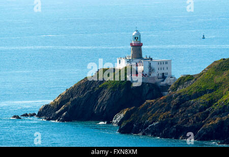 Le scogliere di Howth e faro, Irlanda Foto Stock