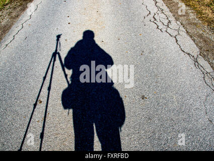 Fotografo ombra su asfalto in Germania Foto Stock