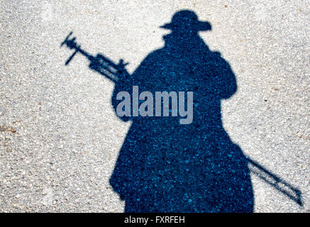 Fotografo ombra su asfalto in Germania Foto Stock