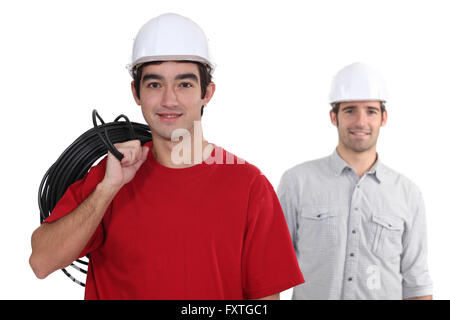 Due elettricisti Foto Stock