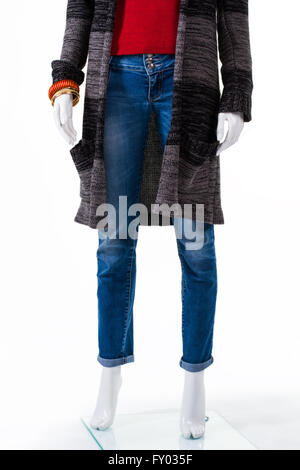 Maglione a strisce e il cappotto di jeans. Foto Stock