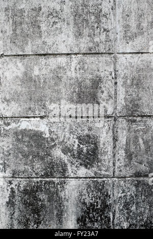 Muro di mattoni di stack bianco sporco Foto Stock