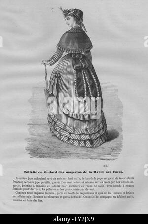 Moda: elegante signora parigina, antica stampa 1869 Foto Stock