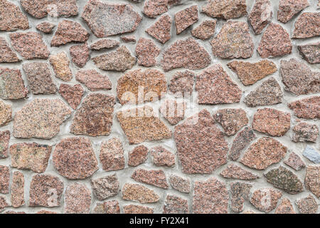 Muro di pietra (recinto). Ritratto di close-up di mattoni. Foto Stock