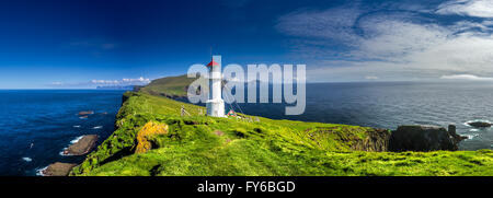 Faro sul Mykines, Isole Faerøer Foto Stock