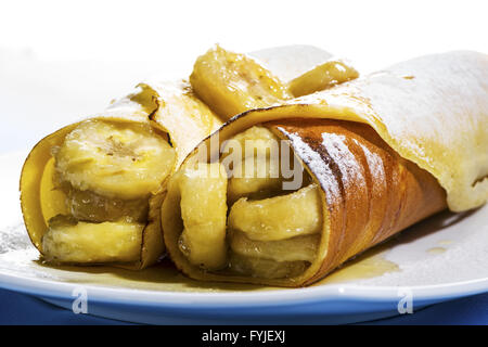 Frittelle o crepes con banana Foto Stock