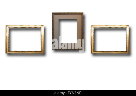 In legno dorato di cornici per foto su sfondo isolato Foto Stock