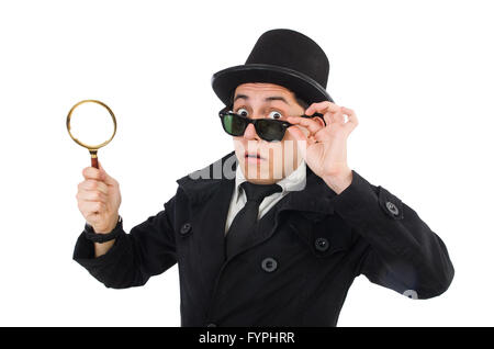 I giovani detective in cappotto nero tenendo la lente di ingrandimento isolato Foto Stock