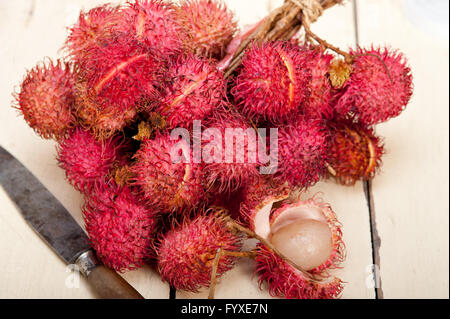 Freschi frutti di rambutan Foto Stock