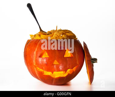 Zucca di Halloween, all'interno illuminato da luce, creepy cercando Foto Stock