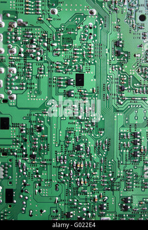 Green striped electronics circuit details in plate Foto Stock