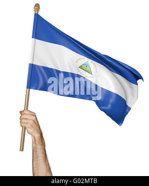 Mano orgogliosamente sventolare la bandiera nazionale del Nicaragua, rendering 3D Foto Stock