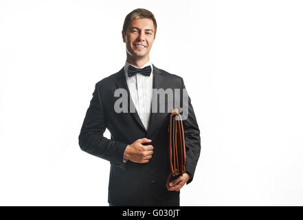 Giovane uomo d affari in possesso di una valigia Foto Stock