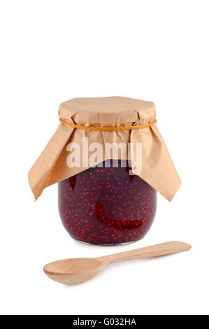 Inceppamento nel vaso, il cucchiaio di legno, isolato su sfondo bianco. Foto Stock