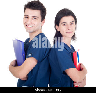 Gentile team di medici azienda cartelle isolato su sfondo bianco (nella parte posteriore) Foto Stock