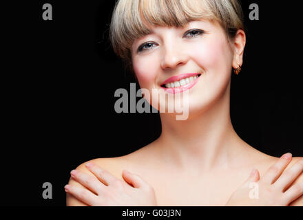 Ritratto di donna vicino. Le spalle nude. Foto Stock