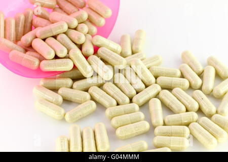 Prescrizione fuoriuscito capsule da rosa ciotola rotonda Foto Stock