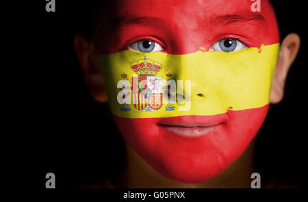 Ritratto di un bambino con un dipinto di bandiera della Spagna Foto Stock