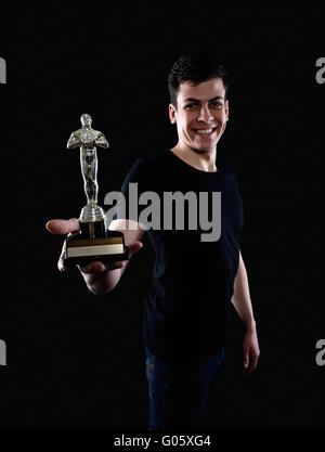 Giovane Azienda fake premio oscar Foto Stock