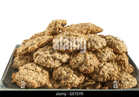 In casa i fiocchi d'avena cookies piastra isolata su bianco b Foto Stock
