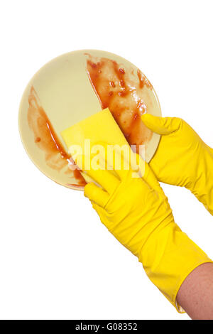 Mani in gomma Guanti gialli di lavaggio della piastra sporca Foto stock -  Alamy