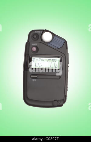 Digital flashmeter, isolato su backrgound verde Foto Stock