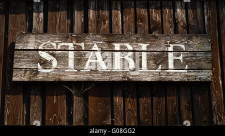 Segno rustico per una stabile in un ranch in Western USA Foto Stock