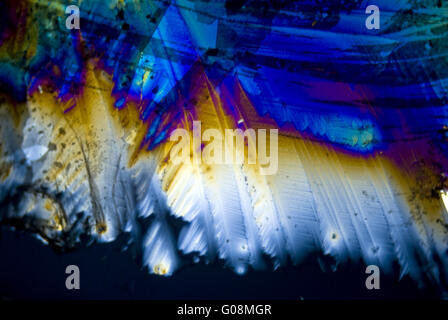 Le particelle di fuliggine e di microcristalli in paglierino polarizzati Foto Stock