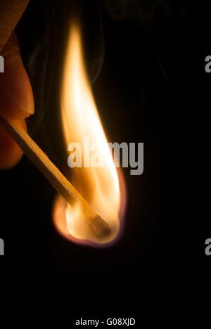 La masterizzazione matchstick Foto Stock