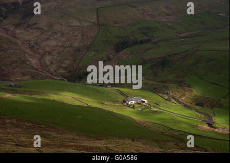 Brennand Farm nella foresta di Bowland visto da di estromissione rastrello Foto Stock