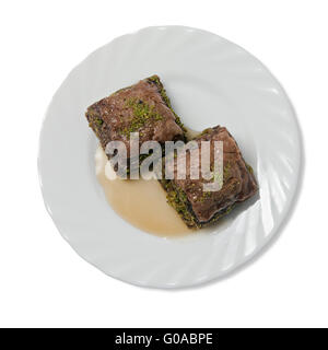 Piastra con bagno turco baklava isolate su sfondo bianco Foto Stock