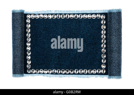 Il denim telaio piegato in forma di manoscritti,scorrimento isolati su sfondo bianco, con spazio per il testo Foto Stock