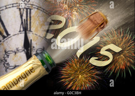 Nuovo anno 2015 con popping champagne e fuochi d'artificio Foto Stock