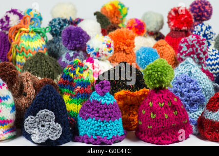 Lavorate a maglia bobble caps Foto Stock