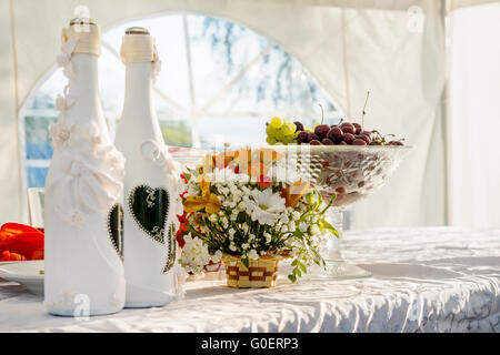 Le uve, fiori e champagne Foto Stock