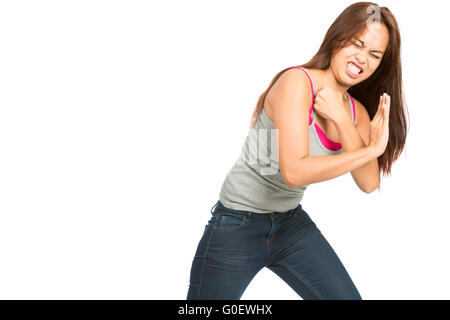 Combattimenti corpo di donna spingendo contro oggetti lato H Foto Stock