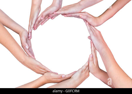 Molte armi di bambini con le mani facendo cerchio Foto Stock