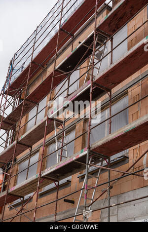 Sicurezza dei cantieri di costruzione ponteggio in fase di costruzione Foto Stock